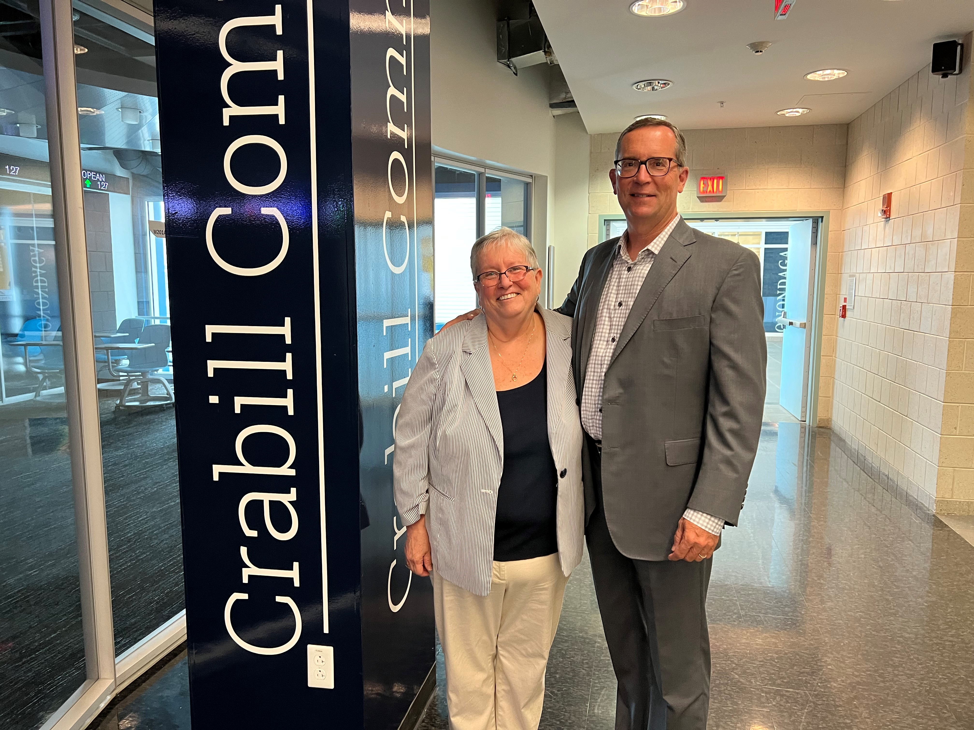 Retiring OCC President Dr. Casey Crabill (left) is pictured with Mark Tryniski '81 (right) of OCC's Board of Trustees. Whitney Commons was renamed "Crabill Commons" thanks to a $100,000 gift from Community Bank.