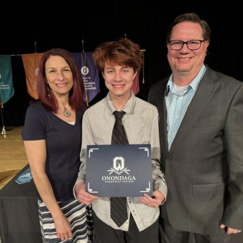 Lou Kaminski (center) was one of the more than two dozen students recognized during the Curriculum Honors ceremony. His parents Kelly (left) and Mike(right) Kaminski are both OCC Alumni and Professors.