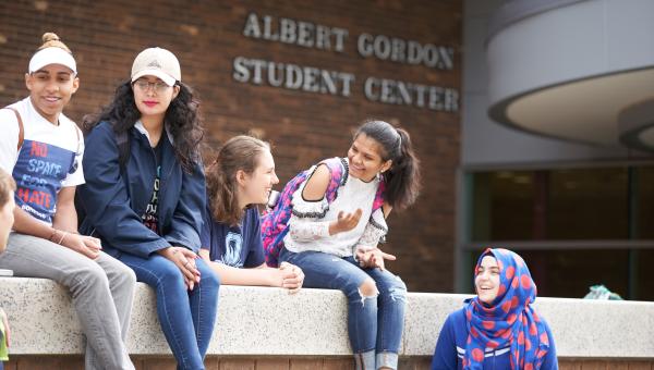 Students Enjoying a Summer Day with Gordon Student Center in Background