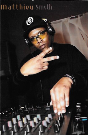 Reggie Manuel at work as DJ Highlander.
