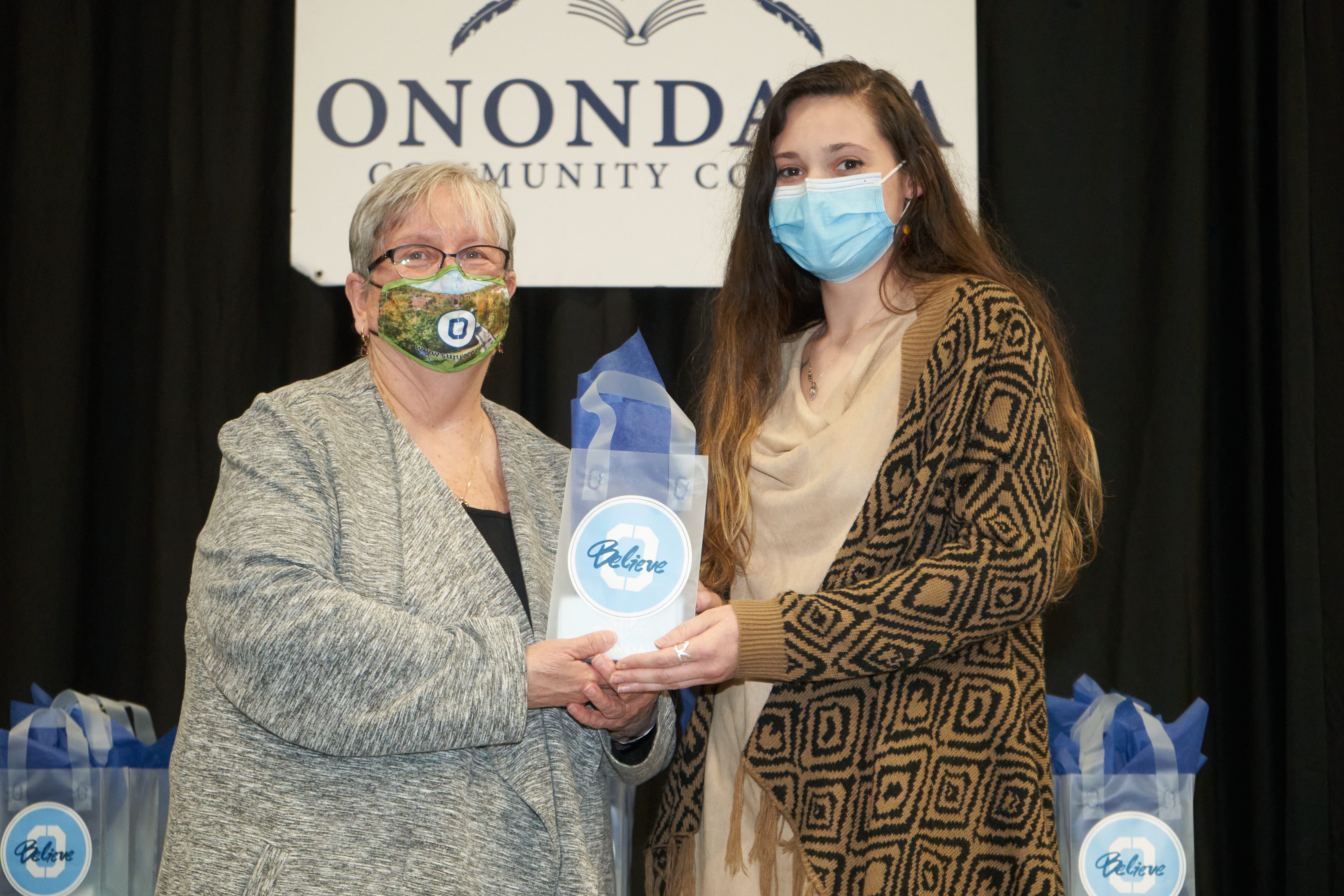 American Sign Language Curriculum Honoree Cassidy Taylor (right) is pictured with OCC President Dr. Casey Crabill (left).