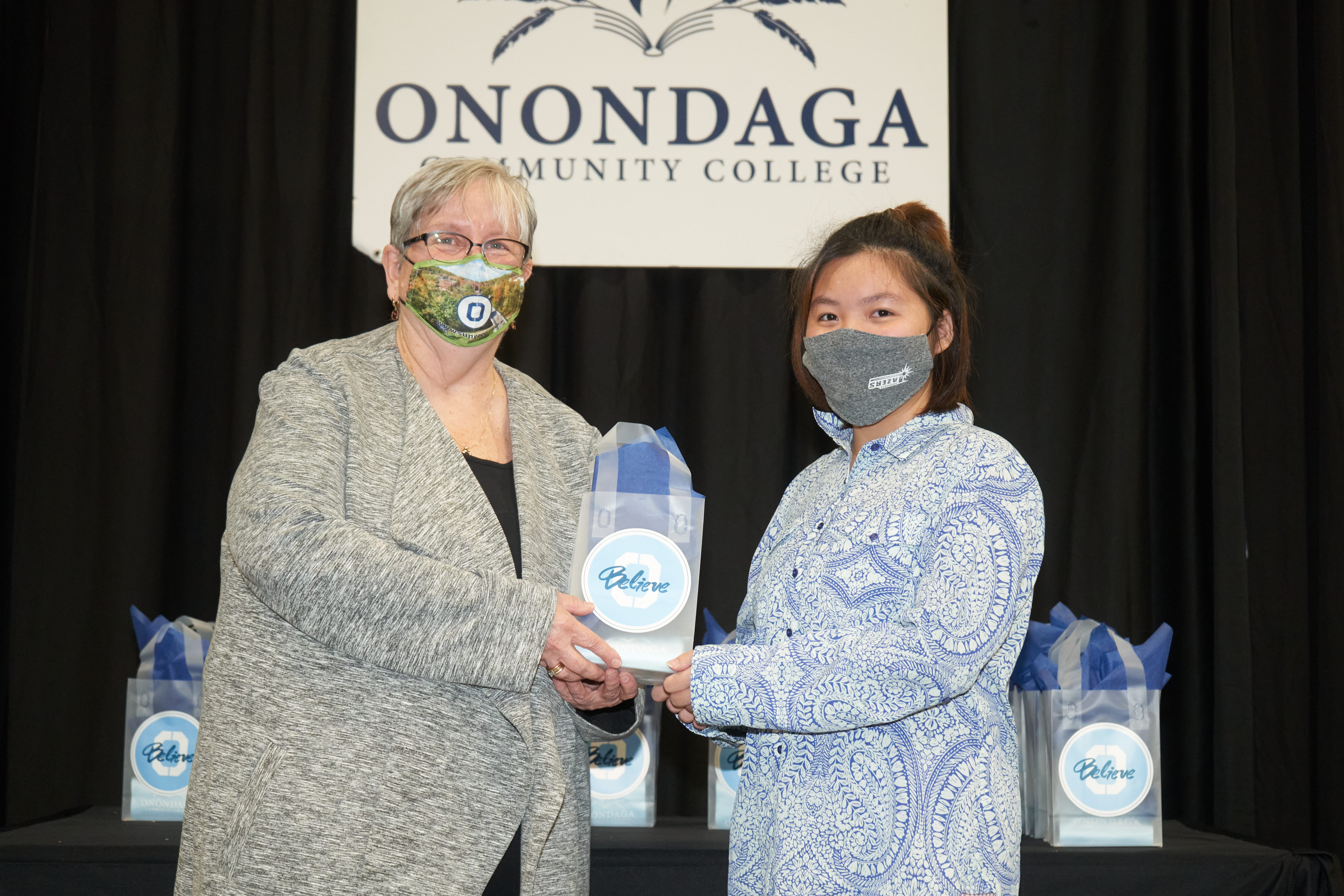 Humanities & Social Sciences Curriculum Honoree Si Po Ra (right) is pictured with OCC President Dr. Casey Crabill (left).