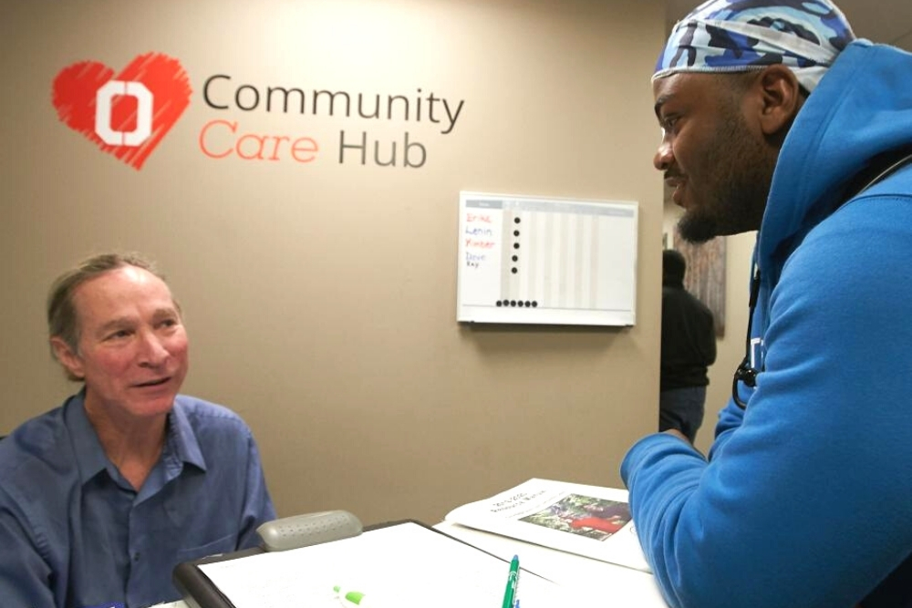 Student checking in at Community Care Hub