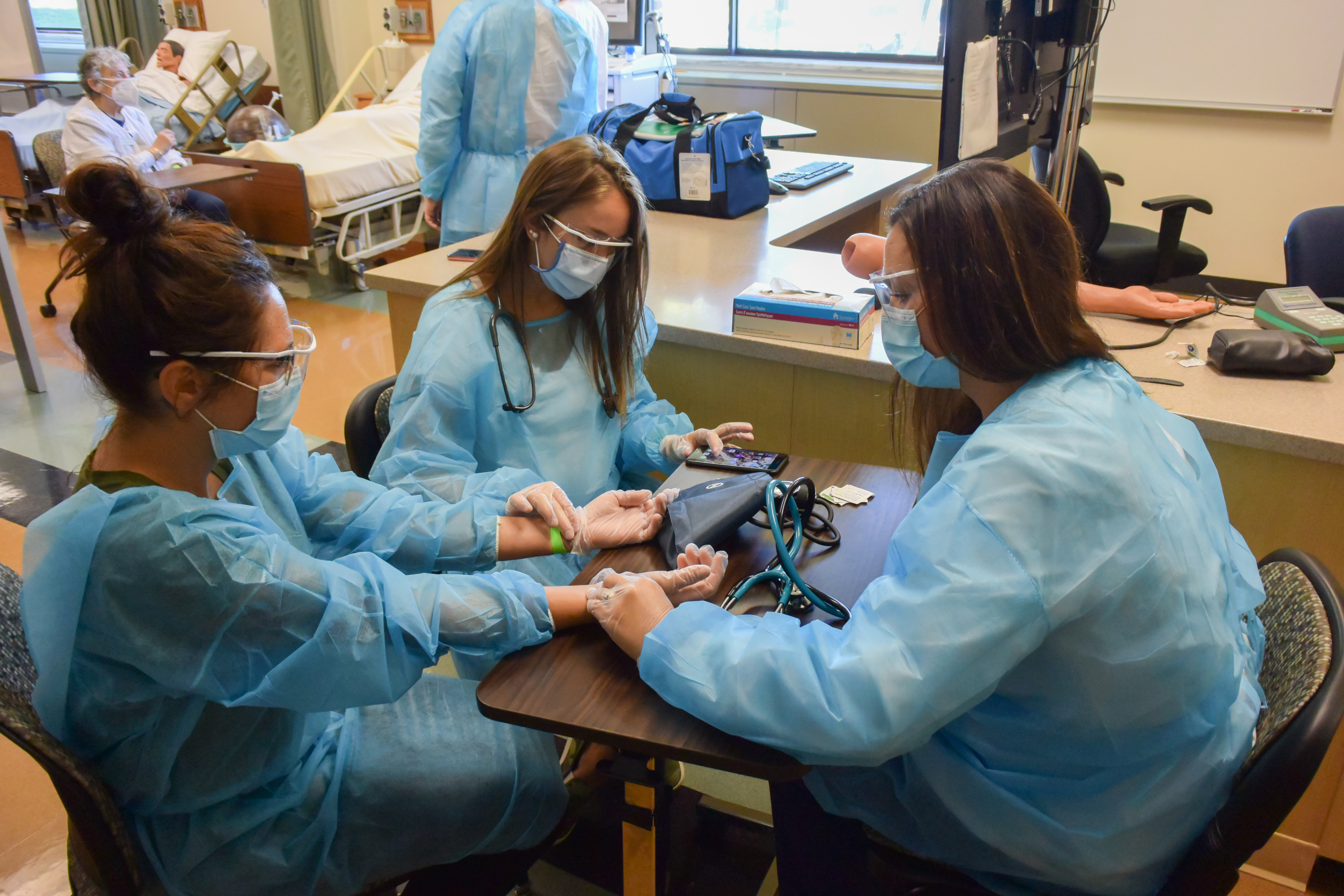 Nursing students learning techniques