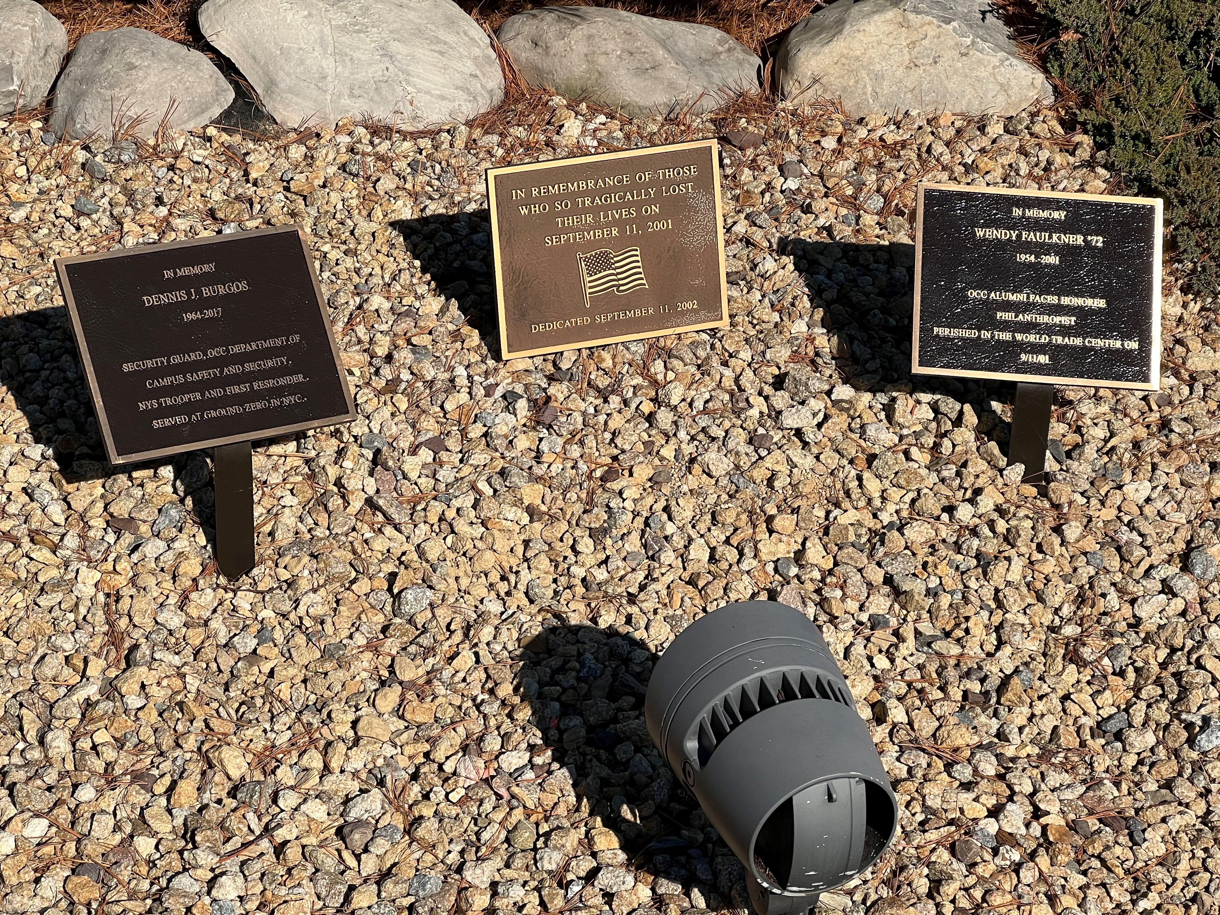 Plaques dedicated to Dennis Burgos and Wendy Faulkner