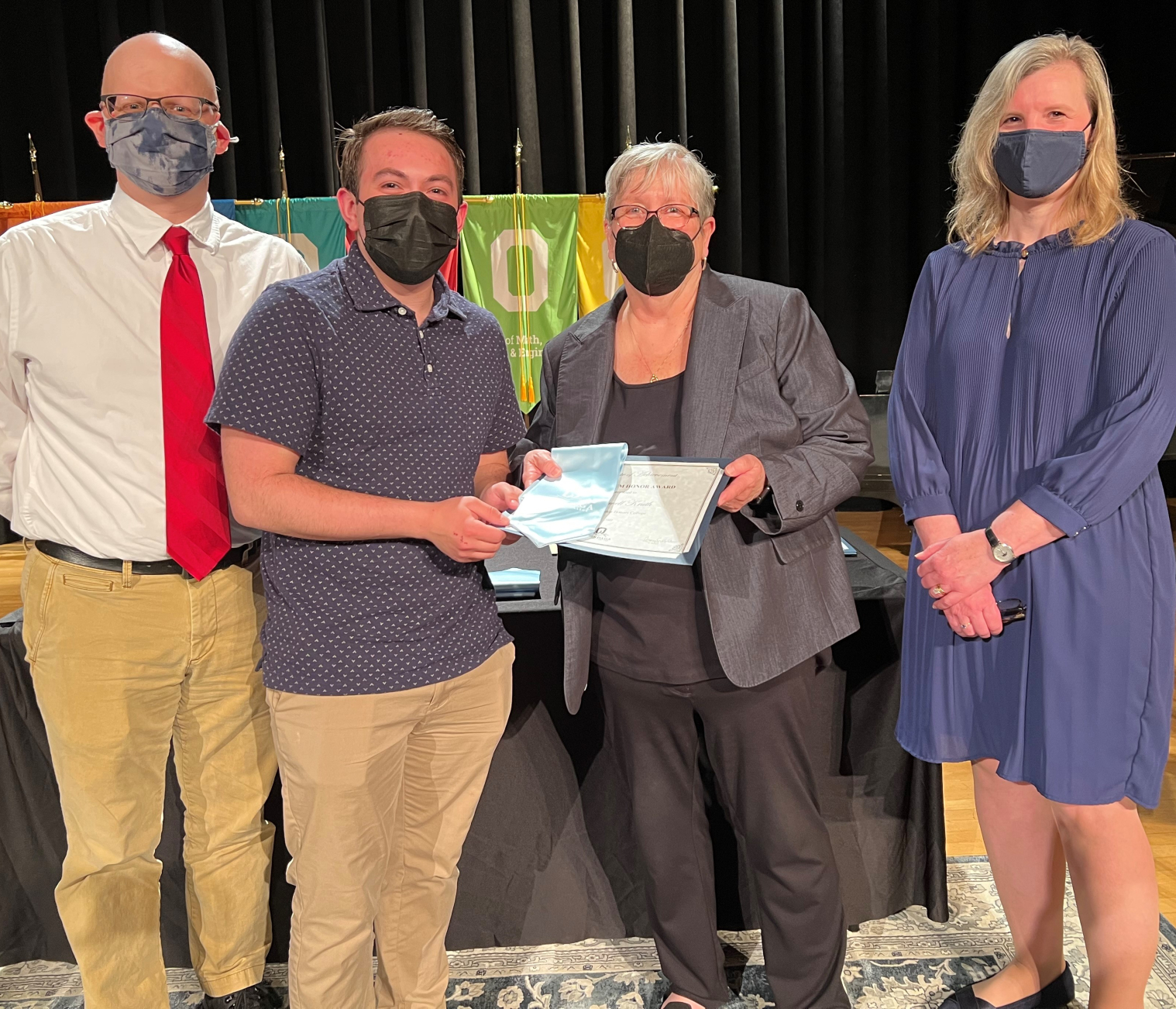 Lillian Slutzker Honors College (left to right): Professor Shawn Weimann, Maxwell Kruth, President Dr. Casey Crabill, and Provost Anastasia Urtz