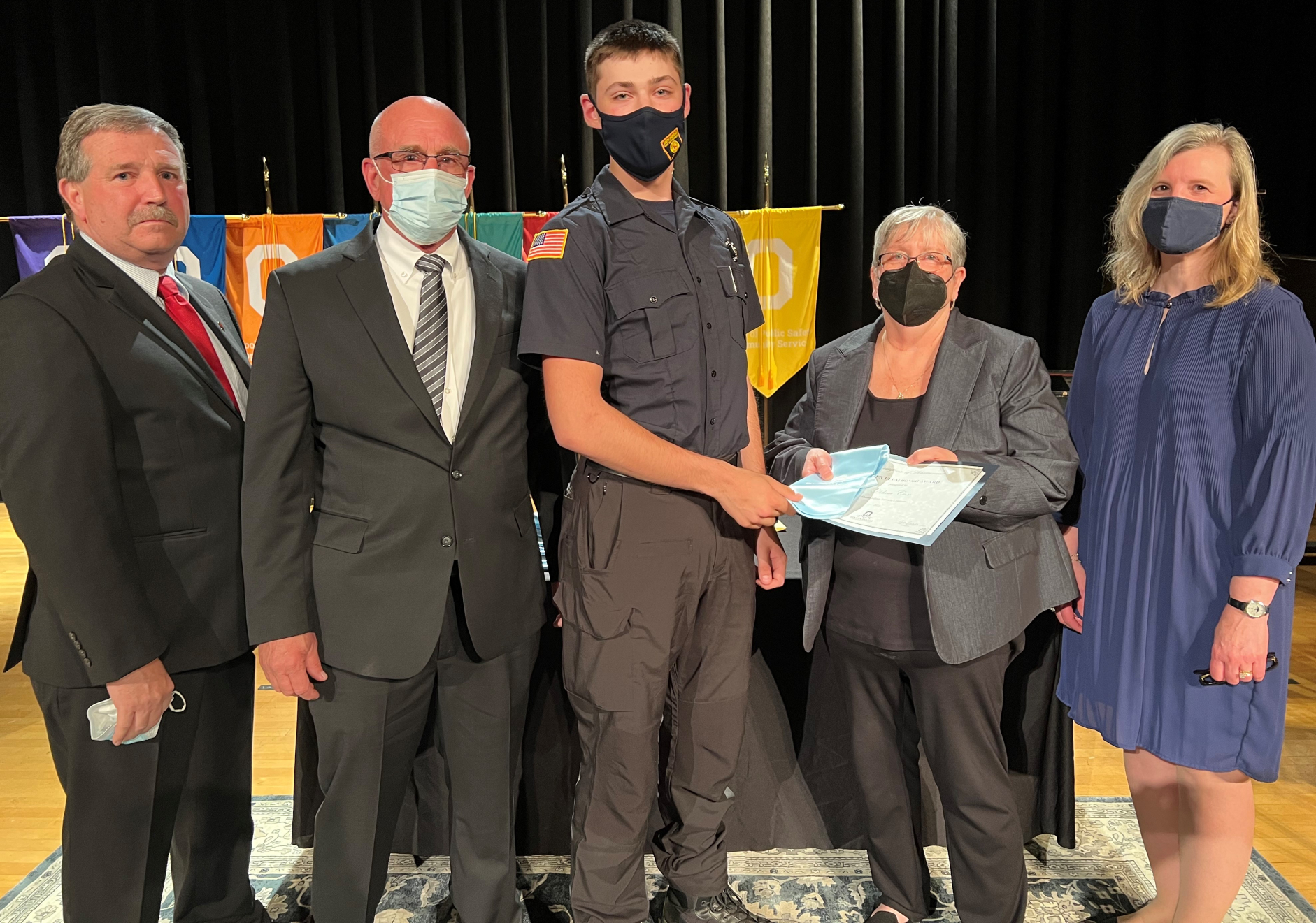 Outstanding Service Learner (left to right): Professor Dan Vieau, Professor Ron Ryan, Adam Cox, President Dr. Casey Crabill, and Provost Anastasia Urtz