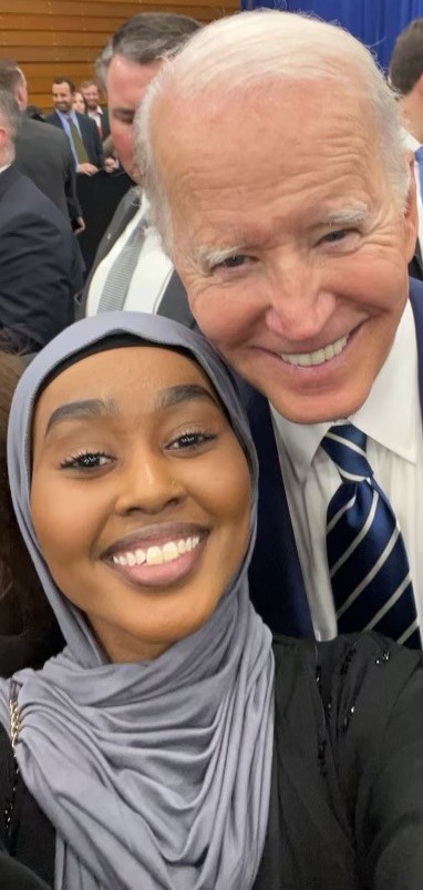 Hassan with President Biden.