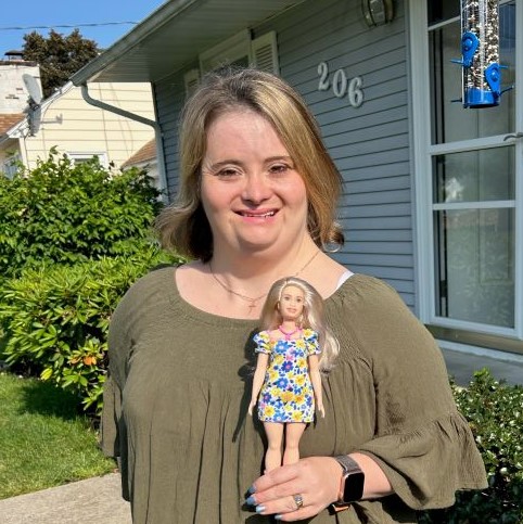 Kayla McKeon '22 worked with Mattel to design a Barbie doll with Down Syndrome. She's a member of OCC's newest class of Alumni Faces honorees.