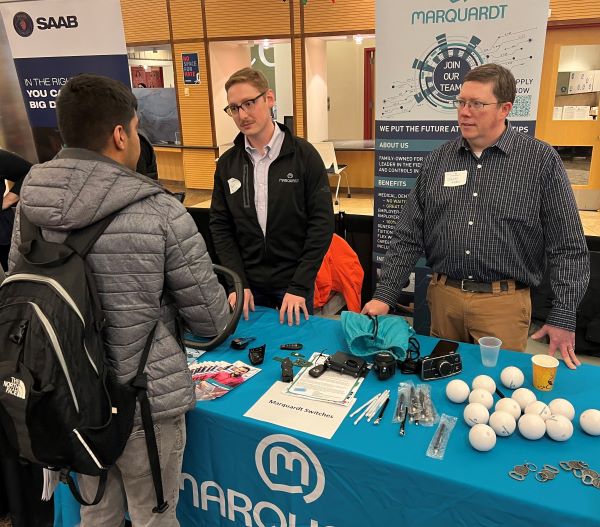 Marquardt Switches representatives Ben Fechtner (left) and John Ryan (right) spoke with students at the STEM Showcase. Fechtner is an OCC Alumnus.