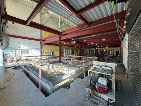 A second floor is being added to two high-bay spaces in the Whitney Applied Technology Center. When finished, the south end of the structure will be the home of the Micron Cleanroom Simulation Lab, along with training centers for HVAC, welding, and CNC machining.