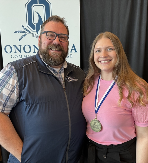 Pinnacle Award winner Haley Madej (right) with OCC's Shawn Edie (left).