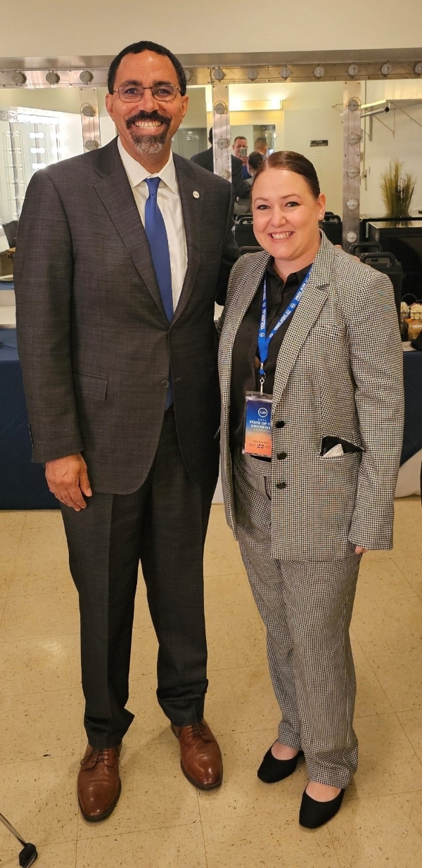 OCC Alumna Danielle Lambert (right) is pictured with SUNY Chancellor John B. King, Jr. (left).