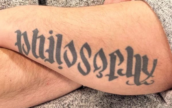... and "Arts & Science" when turned upside down. "I'm a big believer in the importance of education and the foundations the liberal arts set for the world. The fabric for society is built on it."