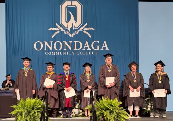 Employee Chancellor's Award winners are (left to right) Ben Miller, Timur Saka, Dr. Phuoc Tran, Patricia Owens, Steve White, Carol Obernesser, and Mandi Salsbury.