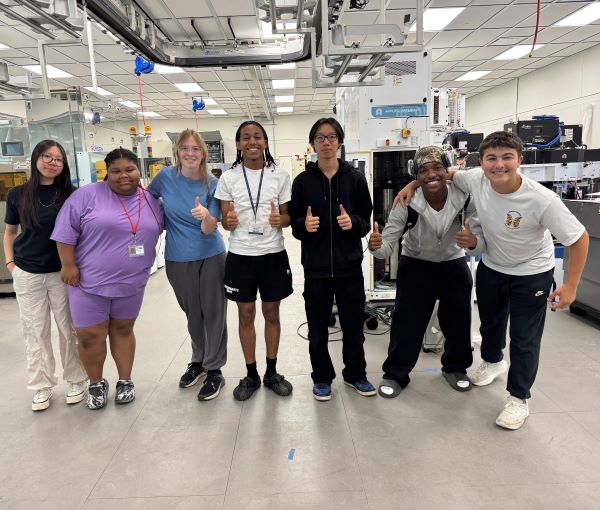Students in the Pre-College Semiconductor Summer Program include (left to right) Sarah Shi, Esther Reader, Rachel Mahan, Frank Guzman, Tony Tran, Reilly Joseph, and Jackson Austin. They're pictured in OCC's new Micron Cleanroom Simulation Lab.