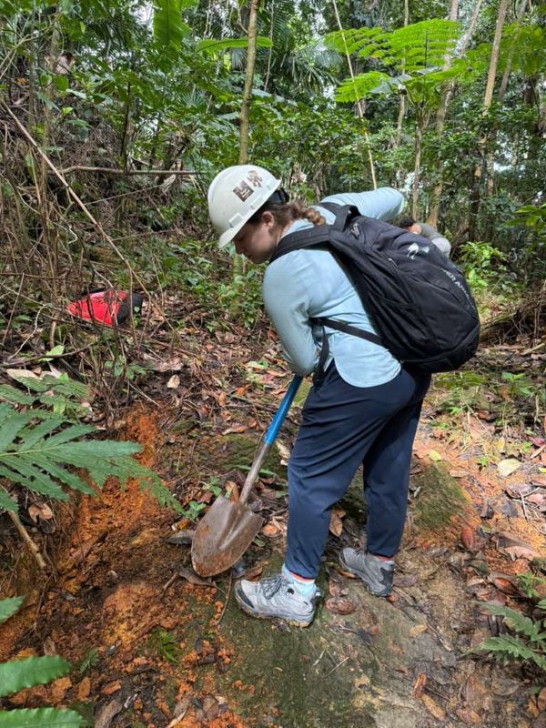 Onondaga Community College Meg O'Connell Scholar Claire Detor helped dig trenches in the El Yunque National Forest in Puerto Rico.