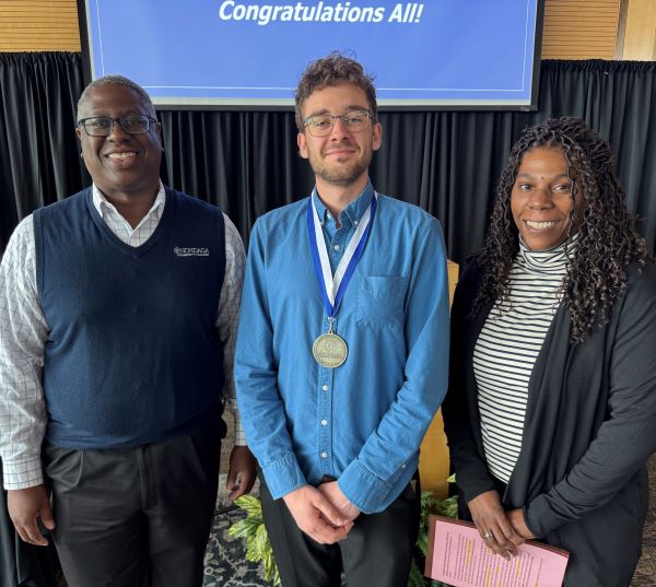 MacIntyre Gorham (center) represented the Office of Accessibility Resources with his Pinnacle Award. He's pictured with OCC President Dr. Warren Hilton (left) and Daneen Brooks of OAR (right).
