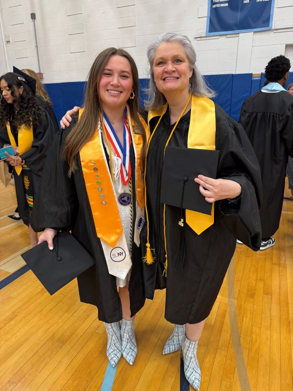 OCC's class of 2026 included Claire Detor (left) and her mother Megan Detor (right) wearing matching boots.