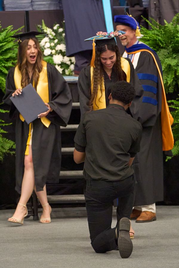 The reaction to the proposal from a fellow graduate!