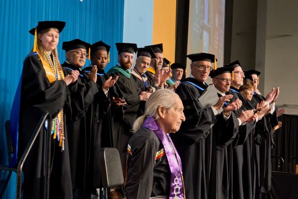 Haudenosaunee Faithkeeper Oren Lyons received a standing ovation when he was presented with his SUNY Honorary Degree.