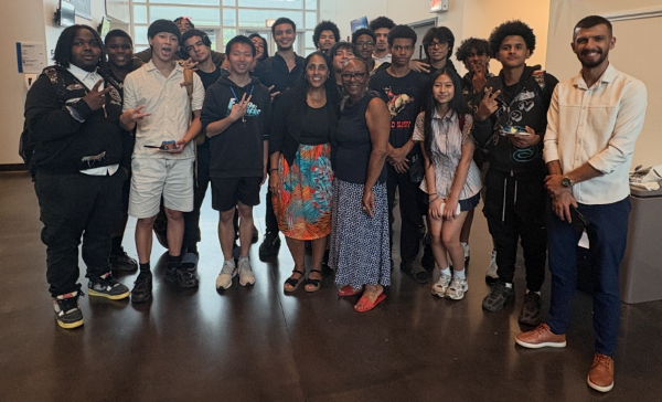 Students posed for a group photo following the ceremony. In the front row (center left) is Karinda Shanes '98, Regional Director for the Hillside Work-Scholarship Connection. Next to her (center right) is Onondaga Community College Vice President Dr. Eunice Williams who oversaw both summer programs.