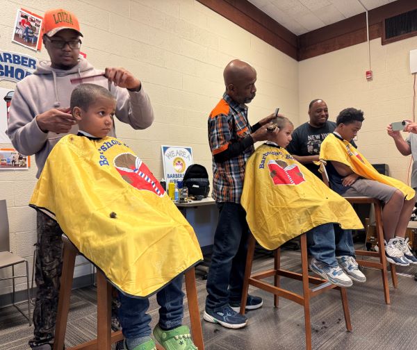 Young readers received free haircuts during the Barbershop Books kickoff event at the Betts Branch Library.