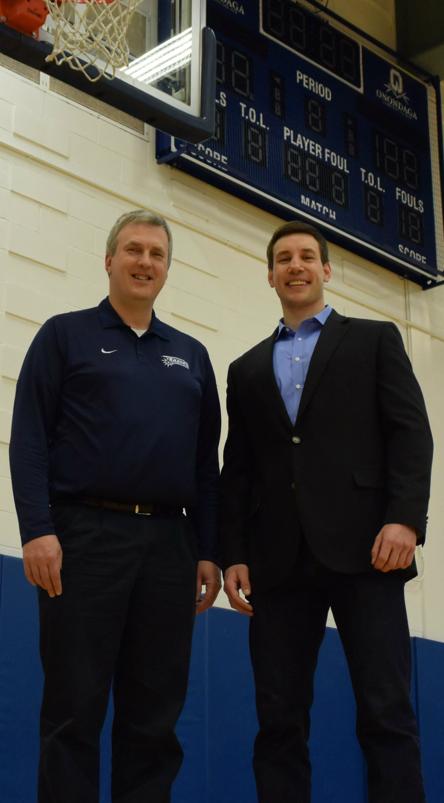 Head Coach Dave Pasiak (left) and Olsen in the Allyn Hall Gymnasium.