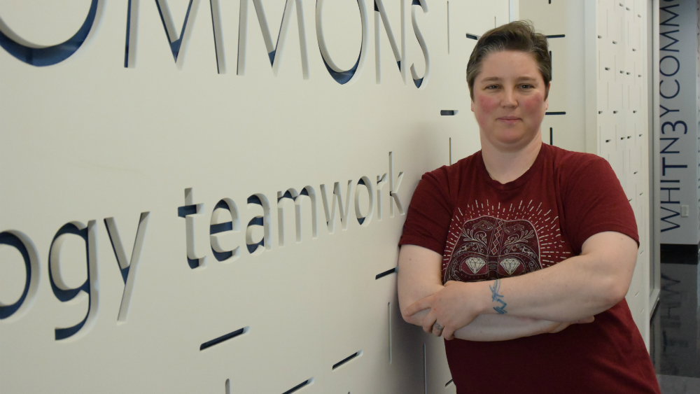 Business Administration major Wendy Emborski is pictured outside Whitney Commons, the eye-catching business classroom on the second floor of the Whitney Applied Technology Center.