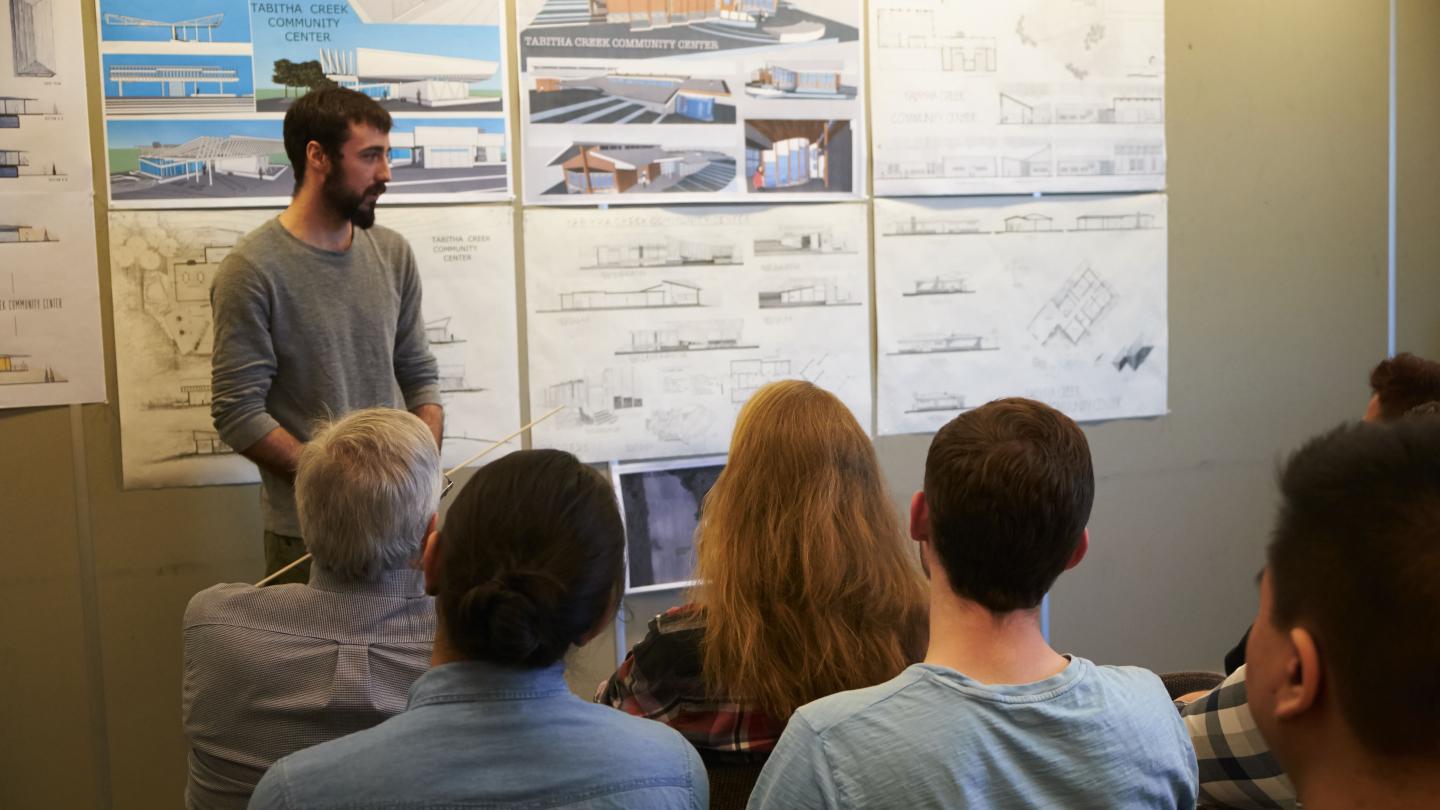 Student giving an architectural presentation