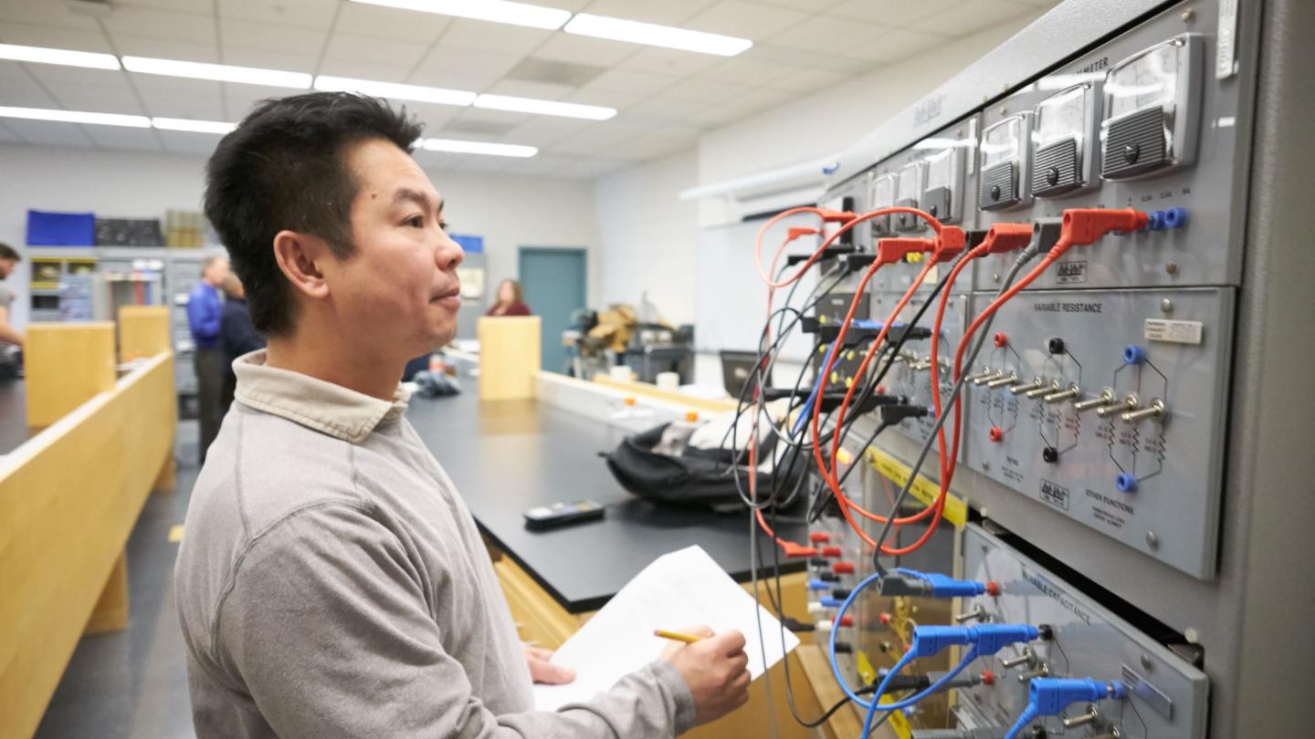 Student working with electrical technology