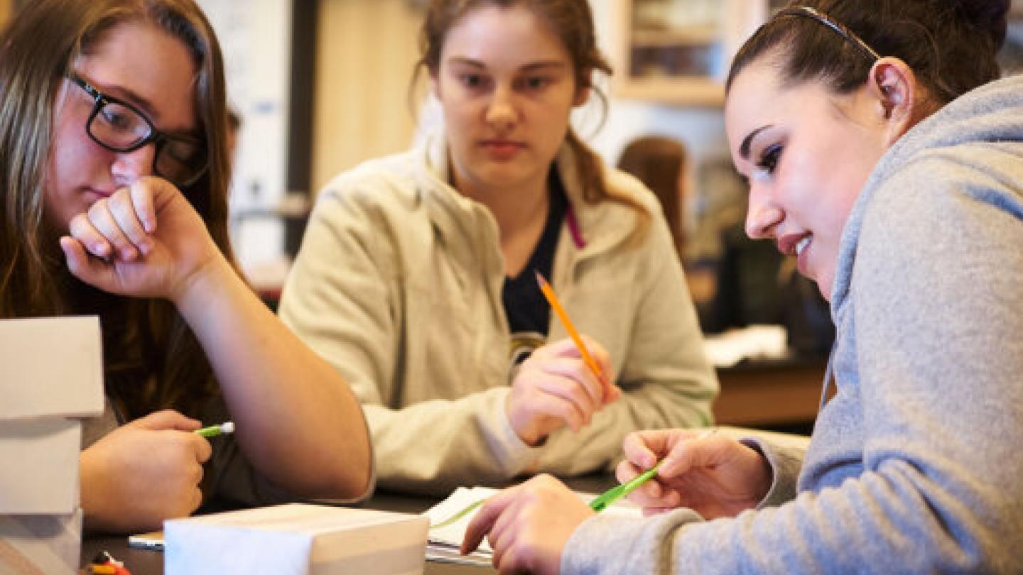 Students working in a group in the classroom