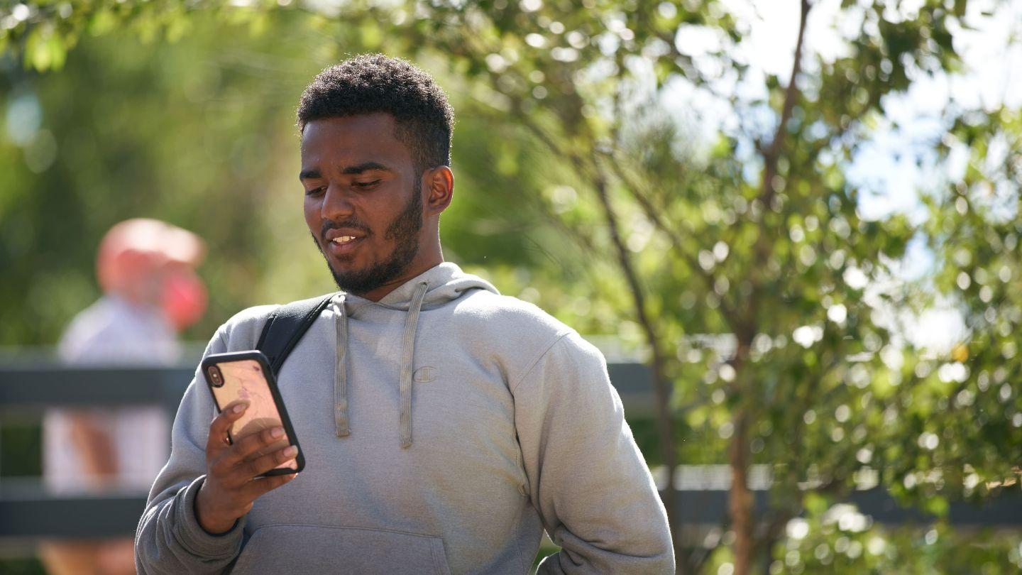 student browsing social media