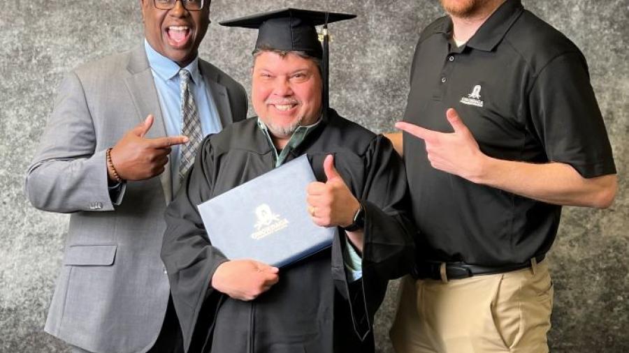 Tom Soccocio Jr. (center) is pictured with OCC President Dr. Warren Hilton (left) and OCC Onboarding Director Ryan Nellenback (right).