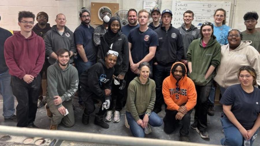 Students, faculty, and staff in the School of Technology, Engineering & Computing participated in community service, building beds for children.