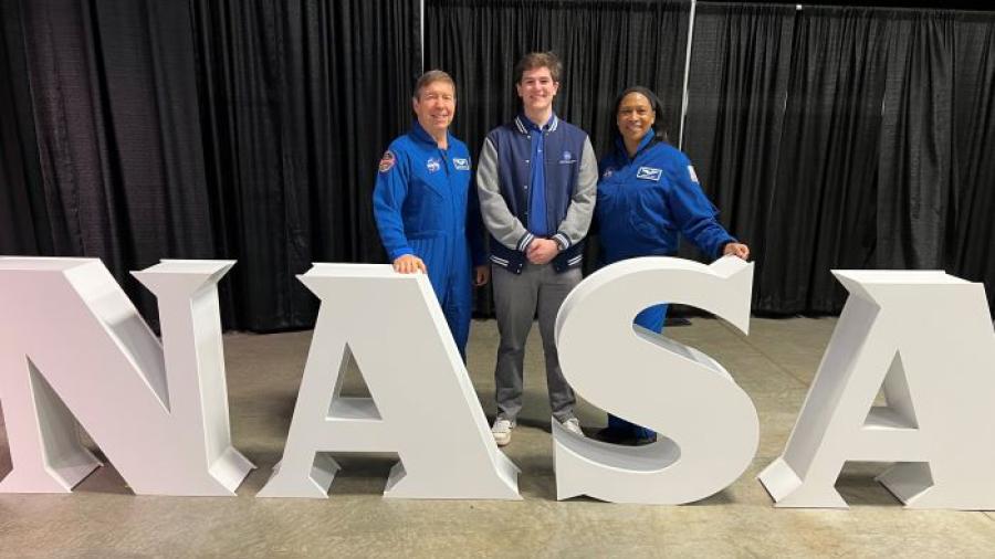 Onondaga Community College Alumnus Isaac Bennett '24 (center) is pictured at NASA with astronauts Dr. Michael Barratt (left) and Jeanette Epps (right) who is a graduate of Syracuse's Corcoran High School.
