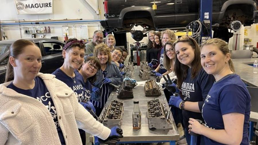 OCC's AAWCC chapter members learn how to replace sparkplugs during their "Ask The Mechanic" event in the Automotive Technology lab on campus.