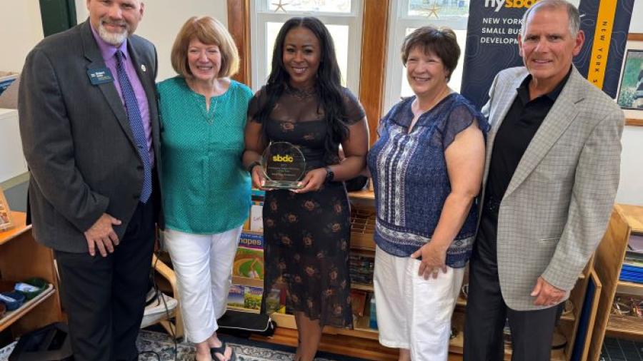 Presenting the Community Impact Business of the Year Award at Birchtree Montessori (left to right): Bob Griffin, SBDC; Karyn Dieffenderfer, Birchtree Montessori; Sonya Smith, SBDC; Rosemary Morgese, Birchtree Montessori; Mark Pitonzo, SBDC.