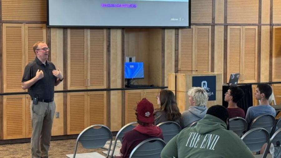 Micron's Mike Guttman speaks with students about paid summer internship opportunities. Approximately 65 students attended the information session.