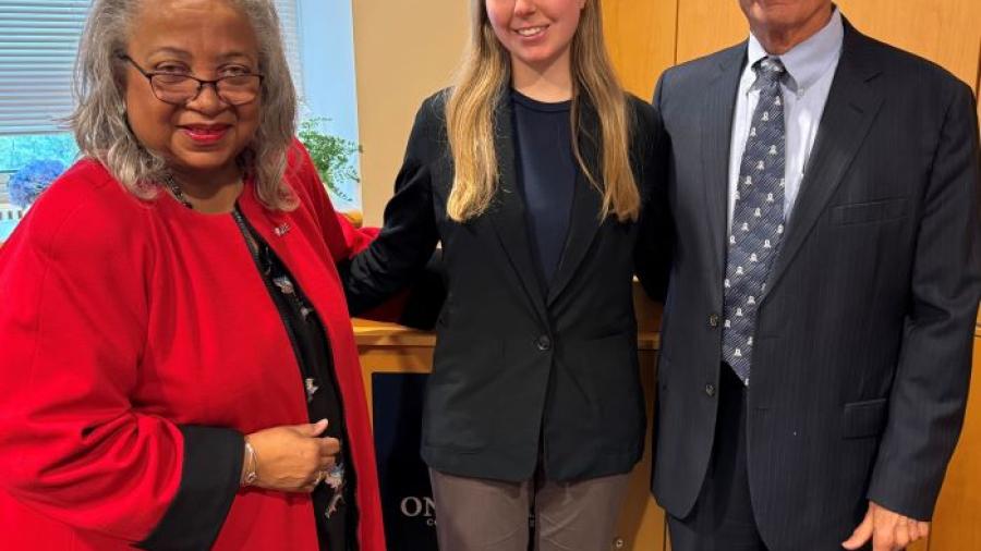 Vicki R. Brackens (left) was sworn in to OCC's Board of Trustees along with returning Student Trustee Alicia Oberlender (center) by Board Chair John P. Sindoni (right).