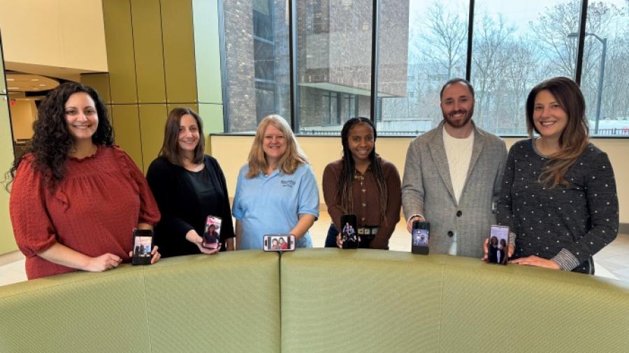 Members of the OCC community showing pictures of their twins are (left to right): Dana Acee, Nicole Schlater, Dana Marzynski, Najier Johnson, David Furney, and Leslie Reid.