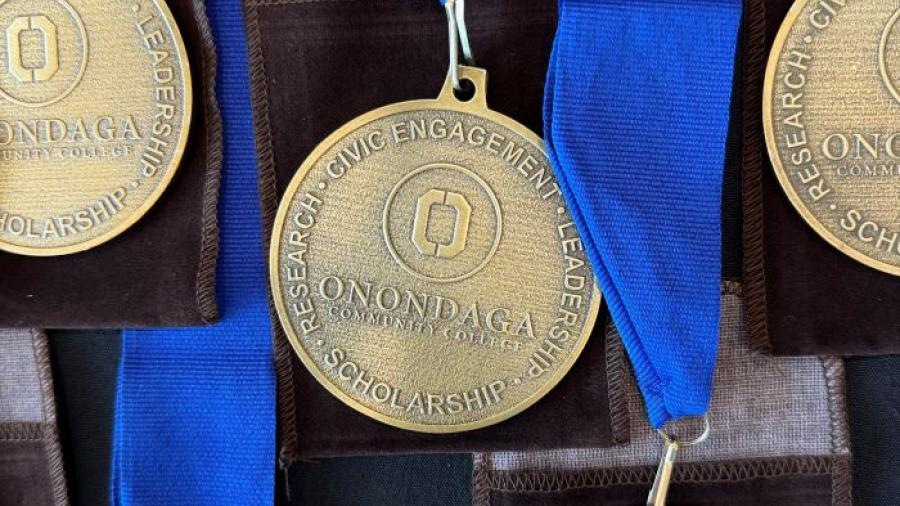 Onondaga Community College Pinnacle Awards recipients were honored with these medals which they will wear at commencement May 16.