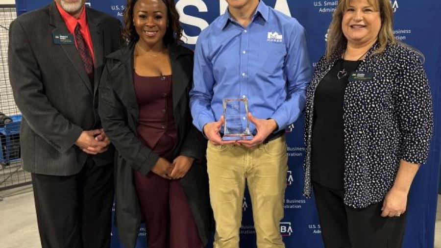 The "Exporter of the Year" Award was presented during National Small Business Week. Pictured (left to right) are Bob Griffin, Sonya Smith, Nate Andrews of Morse Manufacturing, and Kellie Greene.