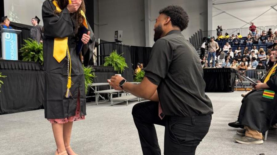 Shaun Barfield (right) proposed to Bellanina Viggiano (left) at commencement.