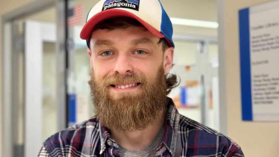 Eric Kreisler is a 33-year-old Student Veteran who will complete his Electrical Technology degree this semester. He's pictured outside OCC's Office of Veterans and Military Services on the second floor of Coulter Hall.