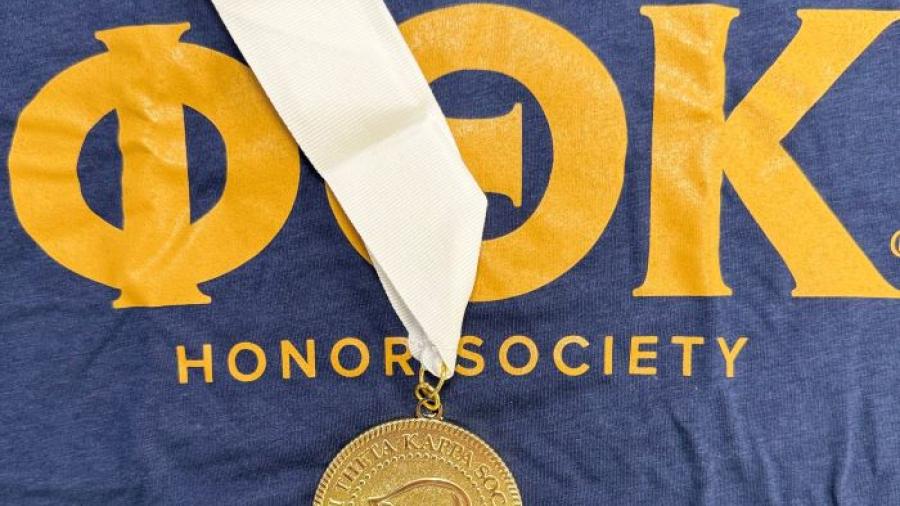 Phi Theta Kappa shirt and medallion