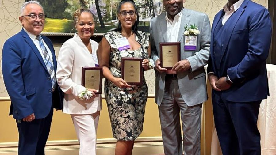 Pictured at the New York Community College Trustees awards are (left to right) OCC Board Chair Jaime Alicea, honoree Melanie Littlejohn, honoree Karinda Shanes '98, honoree Sam Rowser '86, and OCC President Dr. Warren Hilton.