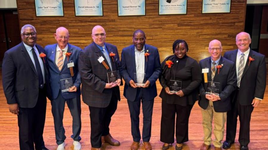 Left to right: OCC President Warren Hilton, honorees Jack Conger, David Johnson Jr., Sam Rowser, Dr. Cynthis E. Bruton-Thomas, Anthony Vadala, and emcee Glenn LaPoint.