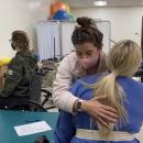 Student providing mobility assistance