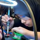 Students experimented with soldering at Micron-sponsored Chip Camp.